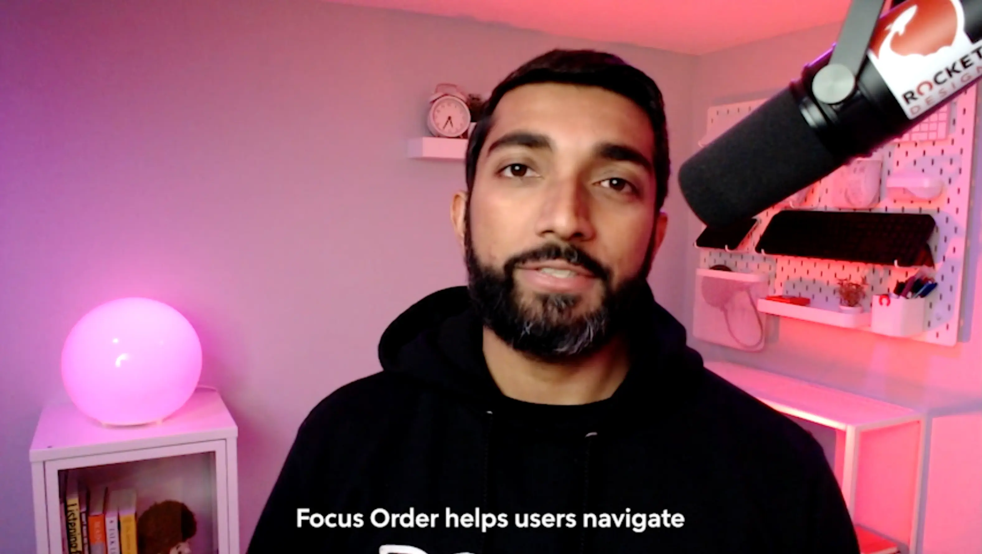 A still from a training video with Bejoy and an annotation about Focus Order.